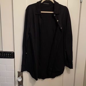 Cut loose black big shirt.